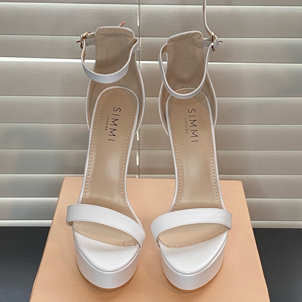 White platform heels
